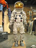 half size apollo space suit in studio