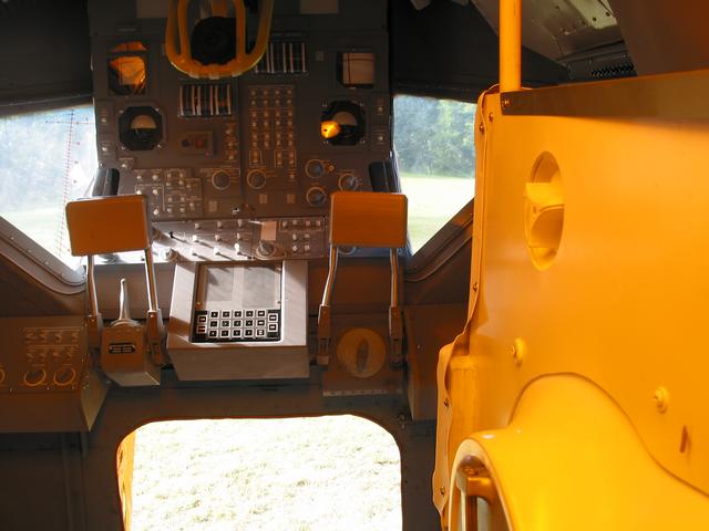 LEM, 2003-2007, 13'X11'X14', aluminum, steel, epoxy, wood, rubber, money
Interior view of crew station looking forward