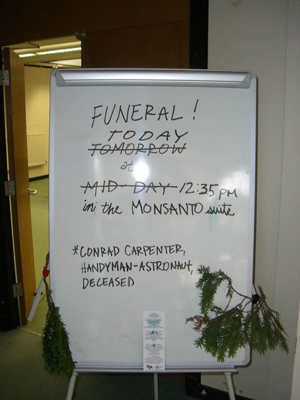 Marker board outside the Monsanto Suite 29 September, 2007.  Monsanto made the nuclear power units used to generate electricity on the moon during Apollo missions.  Now they manufacture GM foods.  Carpenter was a big fan.